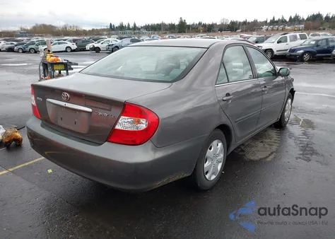 2003 Toyota Camry Le z USA, uszkodzony, nr VIN 4T1BE32K53U668573